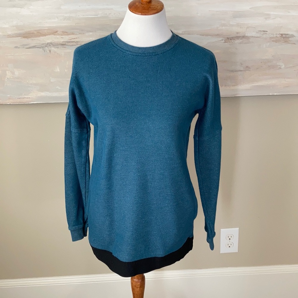 The North Face teal oversized pullover
